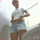 In what appears to be a genuine voyeur video, a hidden camera in a public restroom records a young woman wearing shorts taking a shit, pissing, and then wiping herself. Audio slightly out of sync. See movie #4485 for full-length version.